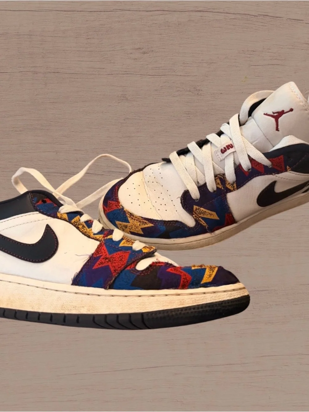 Jordan Low Top Sneakers in White with Black and Multicolor Accents